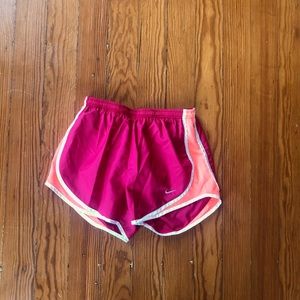 Red and orange Nike shorts